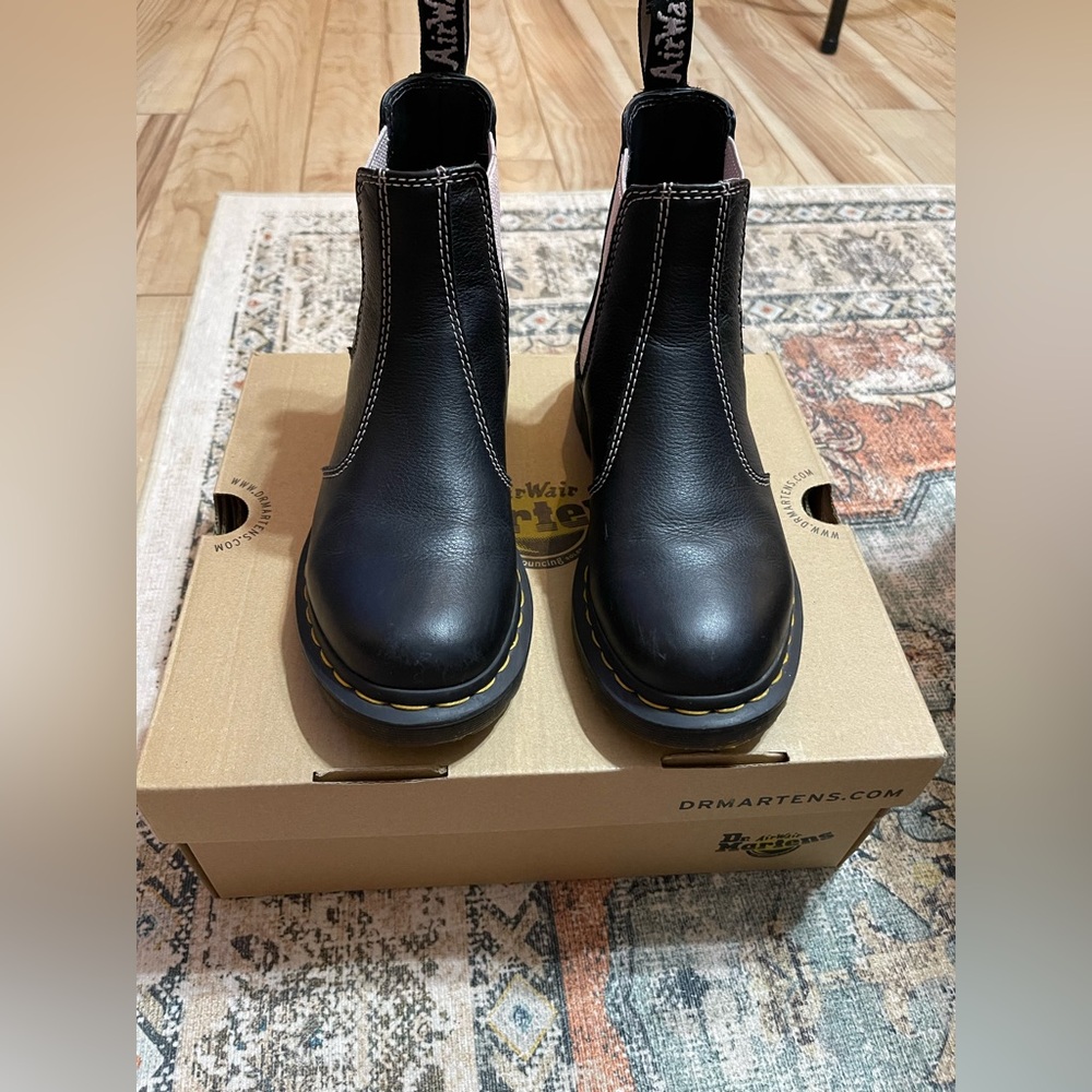 Black and pink Dr. Martens